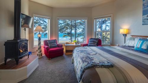 Ένα ή περισσότερα κρεβάτια σε δωμάτιο στο Tyee Lodge Bed And Breakfast