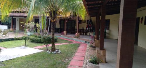 Taman di luar Sítio Java Shammah