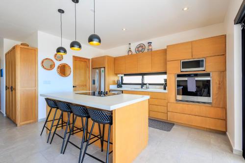 Η κουζίνα ή μικρή κουζίνα στο Cerritos Surf Residences