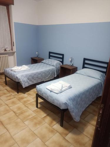 Postel nebo postele na pokoji v ubytování Affittacamere Bacco
