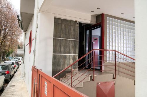 an open door of a building with a balcony at Central & Riverfront Room 1 in Edessa