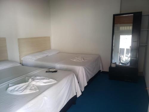 Hotel Orilla Del Marにあるベッド
