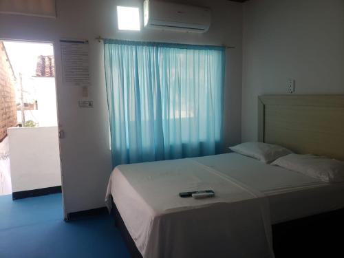 Hotel Orilla Del Marにあるベッド