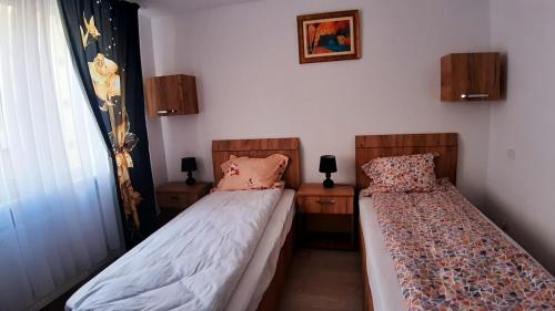 Postel nebo postele na pokoji v ubytování Acasa in Piatra Neamt