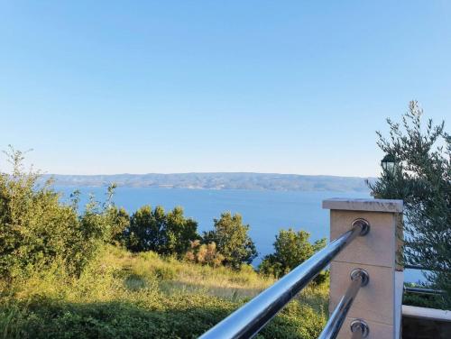 a view of the water from the house at Villa Casa with indoor pool in Krilo