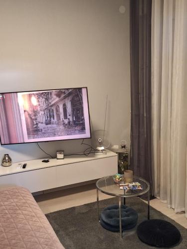 TV/trung tâm giải trí tại Apartment Apex penthouse self check-in