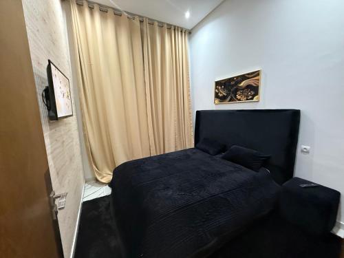 Voodi või voodid majutusasutuse Studio cosy connecté toas