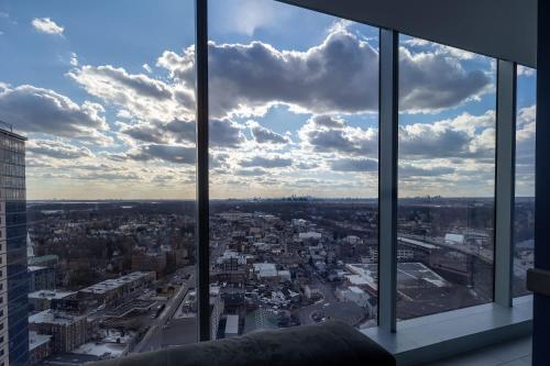 a view of a city from a building at Chic Apt with Indoor Pool & Gym-333-2509 in New Rochelle