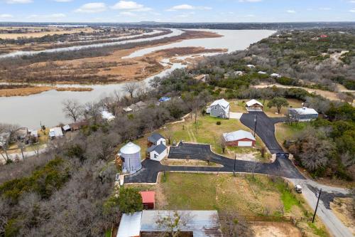 an aerial view of a farm next to a river at 9 Mi to Dtwn Granbury Getaway with Water Views in Weatherford