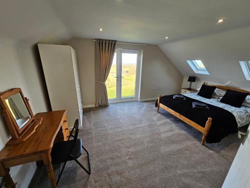 Katil atau katil-katil dalam bilik di Seaside Escape at Ty Bugail - Holyhead