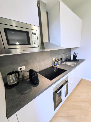 Köök või kööginurk majutusasutuses Monza Apartments