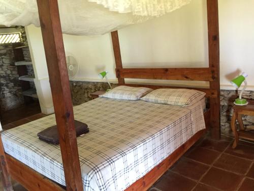 Postel nebo postele na pokoji v ubytování La Princesa de La Isla