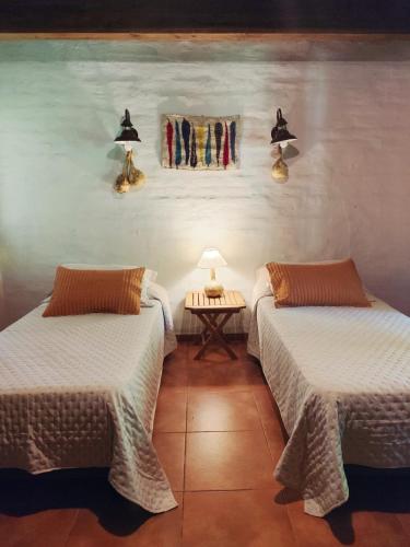 Llit o llits en una habitació de La Chacrita