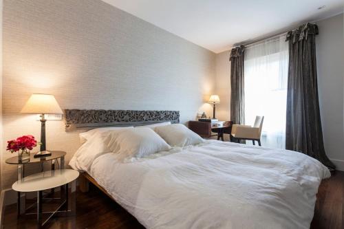 Ένα ή περισσότερα κρεβάτια σε δωμάτιο στο By Plaza de España overlooking Parque María Luisa