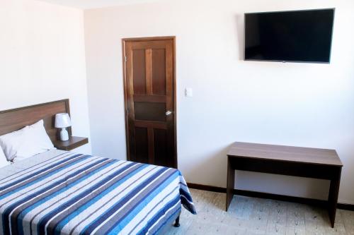 Postel nebo postele na pokoji v ubytování Casa 080