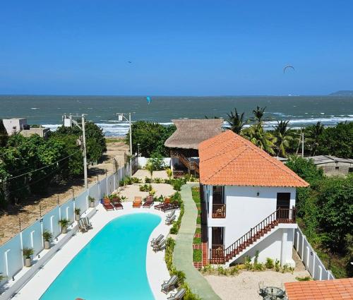 an aerial view of a resort with a swimming pool at Hotel Villa Toti in Santa Veronica