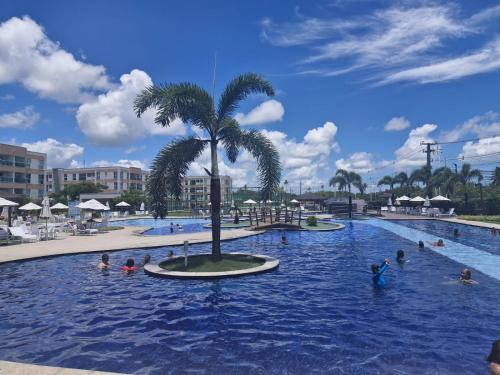 Kolam renang di atau dekat dengan Muro Alto Condomínio Clube