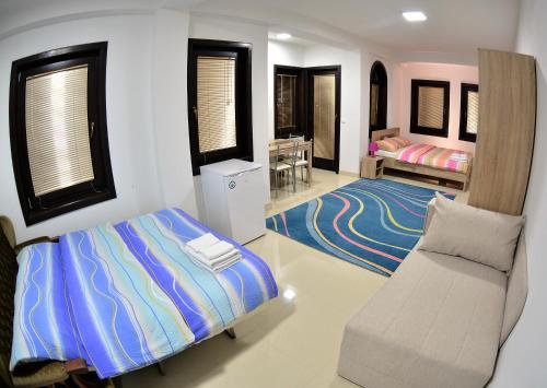 Ένα ή περισσότερα κρεβάτια σε δωμάτιο στο Villa Dudanov