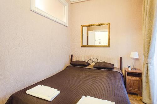 Llit o llits en una habitació de Miracle Apartment Old Arbat