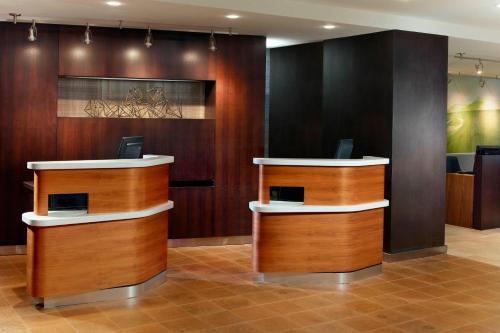 a dental office with wooden walls and wooden counters at Courtyard by Marriott Perimeter Center in Atlanta