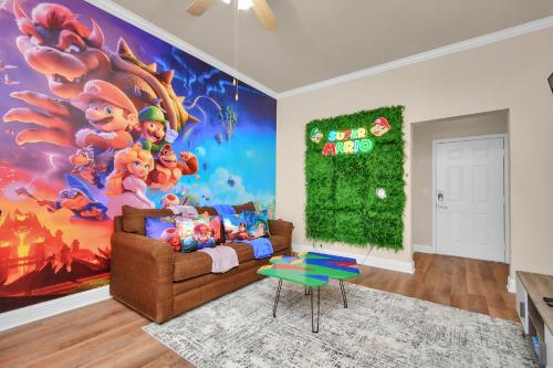 a living room with a large mural of mickey mouse at The Super Mario Bros Movie - 2BR-NRG-Med Center-Galleria in Houston