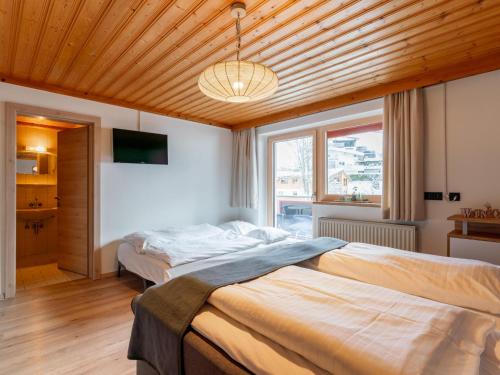 Posteľ alebo postele v izbe v ubytovaní Residenz am Erzbach Top 2A