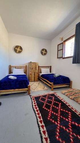 Cama o camas de una habitación en Quadruple room in fisherman house