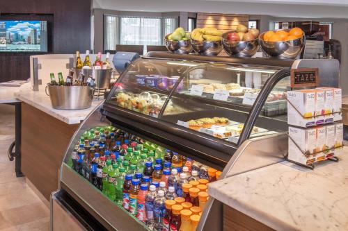 a refrigerator filled with lots of drinks and food at Courtyard By Marriott Baltimore BWI Airport in Linthicum Heights