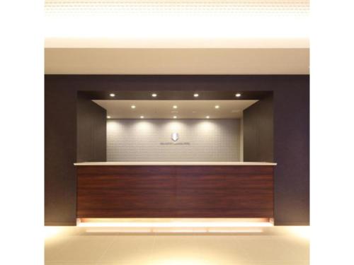 a lobby with a reception desk in a building at New Matto Terminal Hotel - Vacation STAY 01878v in Hakusan