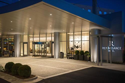 a building with a sign that reads refer my save my bin at Renaissance Atlanta Airport Gateway Hotel in Atlanta
