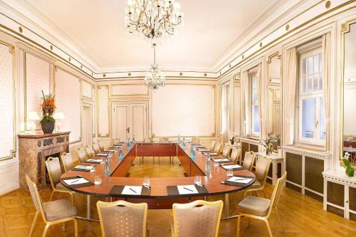 a large conference room with a large table and chairs at Falkenstein Grand, Autograph Collection in Königstein im Taunus