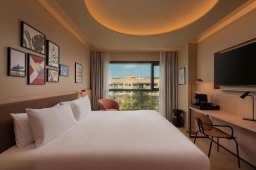 Ένα ή περισσότερα κρεβάτια σε δωμάτιο στο Four Points by Sheraton Barcelona Diagonal