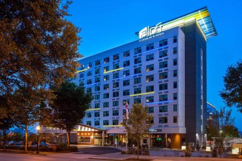an exterior view of the hotel at night at Aloft Atlanta Downtown in Atlanta