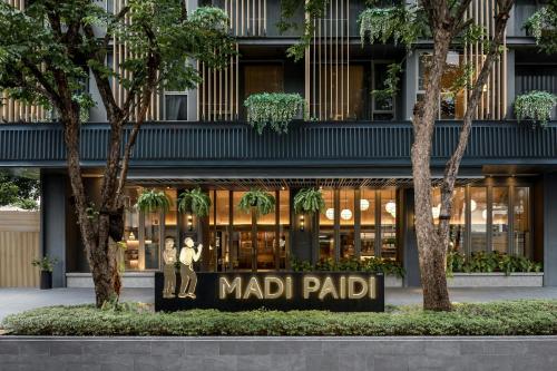 a madrid mall with a sign in front of it at Madi Paidi Bangkok, Autograph Collection in Bangkok