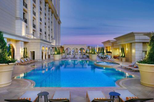 a large swimming pool in the middle of a building at The Ritz-Carlton, Amman in Amman