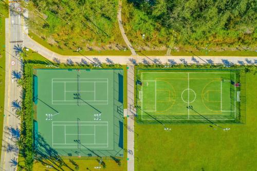 an overhead view of a tennis court with a soccer field at Paragraph Resort & Spa Shekvetili, Autograph Collection in Shekvetili