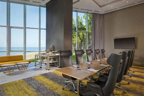 a conference room with a conference table and chairs at Paragraph Resort & Spa Shekvetili, Autograph Collection in Shekvetili