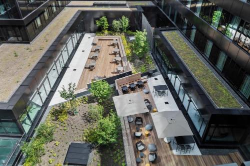 an overhead view of a restaurant in a building at Courtyard by Marriott Freiburg in Freiburg im Breisgau