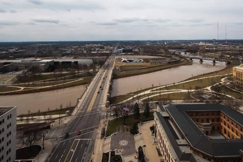 a bridge over a river in a city at Hotel LeVeque, Autograph Collection in Columbus