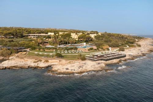an aerial view of an island in the ocean at Mangia's Brucoli, Sicily, Autograph Collection in Brucoli