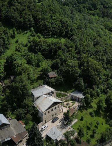 an aerial view of a house in the middle of a forest at Deghceni clubhouse in Dilijan