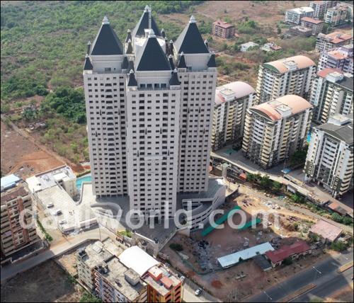 an aerial view of a large building in a city at Nair's Homestay in Manipala