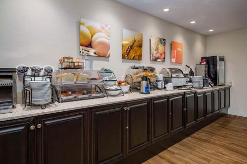 a kitchen with a counter with food on it at Comfort Inn - Gander in Gander