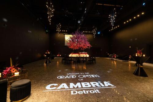 a stage with a grand overview of camarillo detroit sign on it at Cambria Hotel Detroit Downtown in Detroit