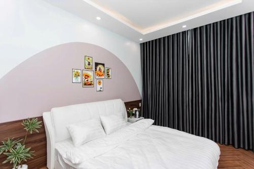 Katil atau katil-katil dalam bilik di Nắng House MỘC CHÂU