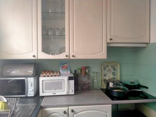 Küche/Küchenzeile in der Unterkunft Court séjour à Paris 2mn de métro