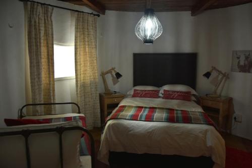 Ένα ή περισσότερα κρεβάτια σε δωμάτιο στο Konka Guest Farm
