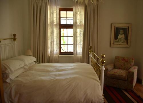 Ένα ή περισσότερα κρεβάτια σε δωμάτιο στο Konka Guest Farm