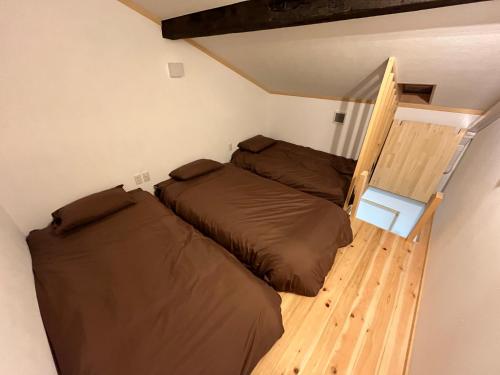 Postel nebo postele na pokoji v ubytování Only one group stays per day -Kanouya-家族や仲間と貸し切り宿 加納屋