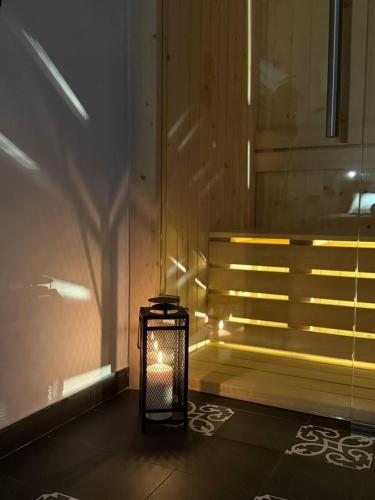 a lantern sitting on the floor of a room at Panta Rei Camere di Charme e Spa in Taranto